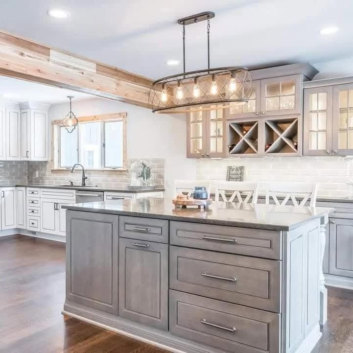 Kitchen and exposed beams designed by Valia Design Build Bloomfield Hills
